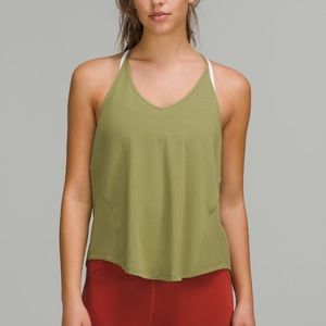 Lululemon model, silk yoga top green